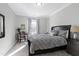 Cozy bedroom with a comfortable bed and work space at 5516 Reach Dr, Raleigh, NC 27616