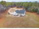 Single-story home on a large lot with wooded surroundings at 95 Somerset Ln, Henderson, NC 27537