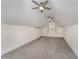 Bonus room with vaulted ceilings, barn doors, and built-in shelving at 95 Somerset Ln, Henderson, NC 27537