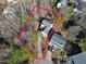 Aerial view of a property with a defined red property line at 109 Stoneline Ct, Holly Springs, NC 27540