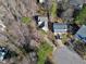 Aerial view of two houses in a wooded neighborhood at 109 Stoneline Ct, Holly Springs, NC 27540