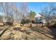 Spacious backyard with wooden fence and plenty of room for outdoor activities at 109 Stoneline Ct, Holly Springs, NC 27540