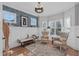 Cozy sitting room with hardwood floors and two armchairs at 117 Rocklyn Ln, Apex, NC 27502