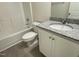 Small bathroom with granite countertop and tub at 171 Wynd Crest Way, Benson, NC 27504