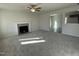 Spacious living room featuring a fireplace and carpet flooring at 171 Wynd Crest Way, Benson, NC 27504
