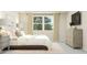 Spacious bedroom with a queen-size bed, dresser, and large window at 1848 Poe Farm Ave, Apex, NC 27502