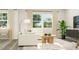 Relaxing living room with a comfortable sofa, coffee table, and large window at 1848 Poe Farm Ave, Apex, NC 27502