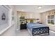 Cozy bedroom featuring a metal bed frame and window seat at 1878 Sweet Gardenia Way, Apex, NC 27502