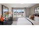 Bright bedroom with large window, dresser, and comfortable bed at 1878 Sweet Gardenia Way, Apex, NC 27502