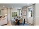 Casual dining area with table and bench seating near sliding glass doors at 1878 Sweet Gardenia Way, Apex, NC 27502