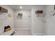 Large walk-in closet with wire shelving and bench at 1878 Sweet Gardenia Way, Apex, NC 27502