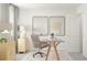 Home office with a glass desk, comfortable chair, and ample natural light at 1888 Sweet Gardenia Way, Apex, NC 27502