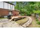 Brick home with deck, partially-finished patio and walkway at 200 Cedarwood Dr, Erwin, NC 28339