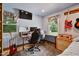Bedroom with a workspace, guitar, and a comfy bed at 200 Cedarwood Dr, Erwin, NC 28339