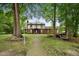 Two-story brick home with walkway and landscaping at 200 Cedarwood Dr, Erwin, NC 28339