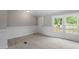 Simple dining area with wood-look floors and wainscoting at 262 Homestead Dr, Selma, NC 27576