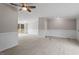 Open dining area with wood-look floors and access to deck at 262 Homestead Dr, Selma, NC 27576