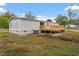 Single-story home with deck and backyard at 262 Homestead Dr, Selma, NC 27576