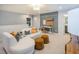 Bonus room with a sectional sofa and a desk area, perfect for a home office at 2786 Farmhouse Dr, Apex, NC 27502