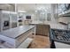 Modern kitchen features stainless steel appliances and an island at 2786 Farmhouse Dr, Apex, NC 27502