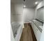 Bathroom boasts double sinks, granite countertops, and a soaking tub at 359 Magnolia Run Way, Benson, NC 27504