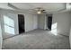 Bright bedroom with ensuite bathroom access and ceiling fan at 359 Magnolia Run Way, Benson, NC 27504