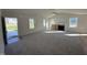 Bright living room features a fireplace and access to the kitchen at 359 Magnolia Run Way, Benson, NC 27504