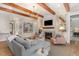 Bright living room with hardwood floors and a focal fireplace at 403 Stonecrest Way, Pittsboro, NC 27312