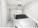 Attached garage with overhead door and space for one car at 4075 Elk Creek Ln # 9, Raleigh, NC 27612