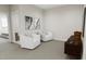 Bright sitting area with two armchairs and natural light at 4075 Elk Creek Ln # 9, Raleigh, NC 27612