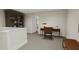 Functional home office on upper floor with a modern desk, chair, and bench, perfect for work at 4077 Elk Creek Ln, Raleigh, NC 27612