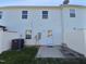 Small backyard with concrete patio and AC unit at 5211 Blue Lagoon Ln, Raleigh, NC 27610