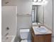 Clean bathroom with a tub, toilet, sink, and vanity at 5211 Blue Lagoon Ln, Raleigh, NC 27610