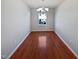 Simple dining room with hardwood floors and a window at 5211 Blue Lagoon Ln, Raleigh, NC 27610