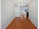 Bright dining room with hardwood floors and chandelier at 5211 Blue Lagoon Ln, Raleigh, NC 27610
