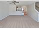 Living room with hardwood floors and a view of the dining area at 5211 Blue Lagoon Ln, Raleigh, NC 27610
