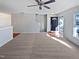 Spacious living room with neutral carpeting and a view of the entryway at 5211 Blue Lagoon Ln, Raleigh, NC 27610