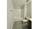 Clean bathroom with shower/tub combo and tile floors at 554 Eversden Dr, Zebulon, NC 27597