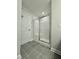 Bathroom with a large shower and tile floors at 554 Eversden Dr, Zebulon, NC 27597