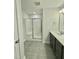 Modern bathroom with shower and double vanity at 554 Eversden Dr, Zebulon, NC 27597