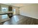 Kitchen dining area with hardwood floors and access to backyard at 554 Eversden Dr, Zebulon, NC 27597