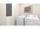 Laundry room with side-by-side washer and dryer at 70 Saddle Mare St, Clayton, NC 27520