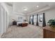 Large main bedroom with plush carpet and two large windows at 806 Knotty Pine Dr, Mebane, NC 27302