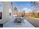 Backyard patio with table and chairs, surrounded by fence at 88 Capewood Ct, Garner, NC 27529