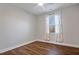 Bright bedroom with hardwood floors and window coverings at 88 Capewood Ct, Garner, NC 27529