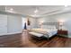 Spacious main bedroom with large walk-in closet and hardwood floors at 88 Capewood Ct, Garner, NC 27529