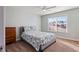 Cozy bedroom with a double bed and large window at 88 Capewood Ct, Garner, NC 27529