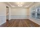 Spacious dining room featuring hardwood floors and chair rail at 88 Capewood Ct, Garner, NC 27529