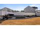 Landscaped garden with raised garden beds and a variety of plants at 88 Capewood Ct, Garner, NC 27529
