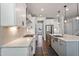 Modern kitchen with stainless steel appliances and white cabinetry at 88 Capewood Ct, Garner, NC 27529